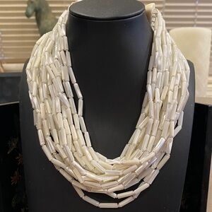 Elegant 20 Strand Mother of Pearl Beaded Necklace with a Bone Clasp